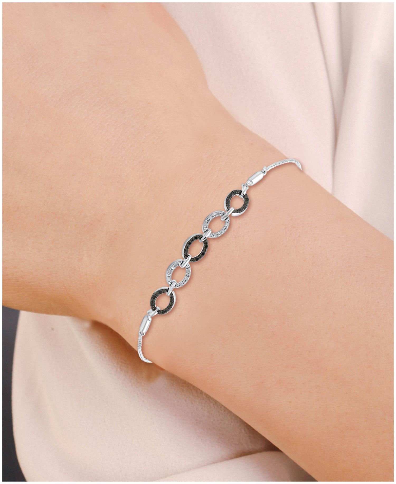 Black Diamond (1/10 ct. t.w.) & White Diamond (1/20 ct. t.w.) Oval Link Bolo Bracelet in Sterling Silver