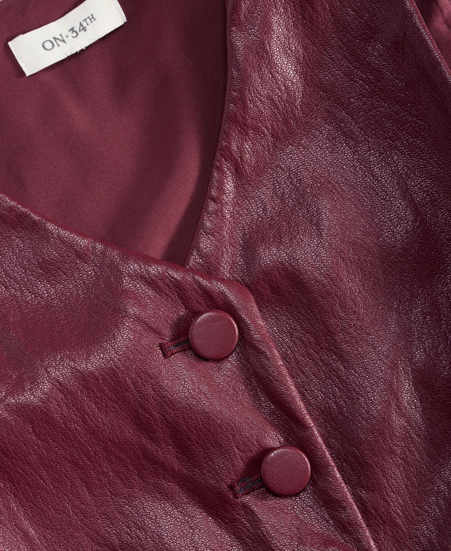 Women's Woven Faux Leather V-Neck Vest
