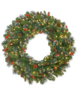 National Tree Company - 30" Crestwood Spruce Wreath With Red Berries, Pine Cones, Glitter & 70 Battery-Operated LED Lights