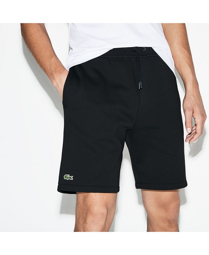 Шорты лакост. Lacoste Sport shorts. Lacoste men shorts. Шорты Lacoste мужские черные. Lacoste logo shorts.