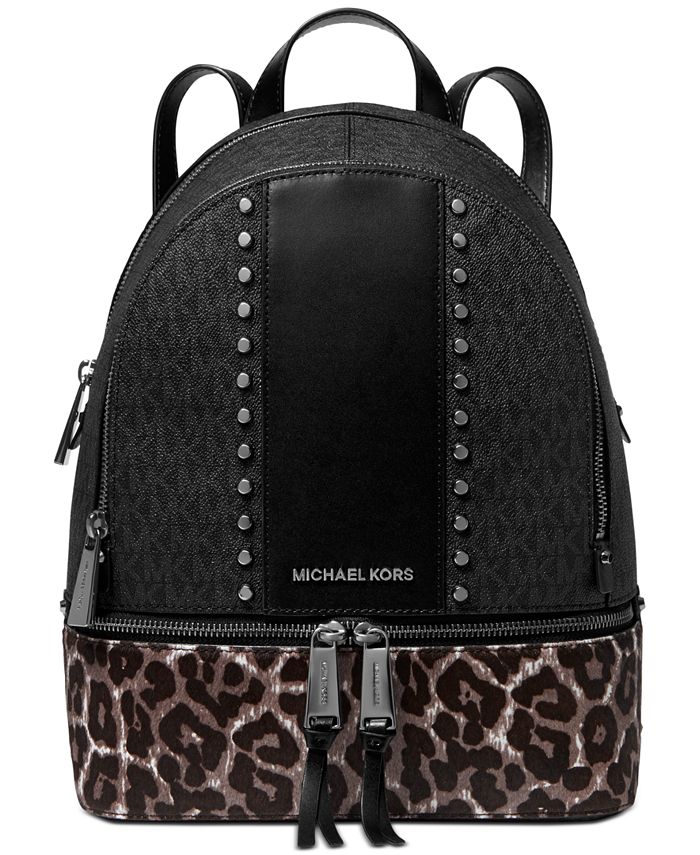 Total 57+ imagen michael kors black cheetah backpack