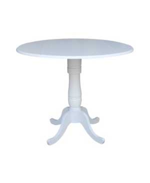 International Concepts 42" Round Dual Drop Leaf Pedestal Table In White