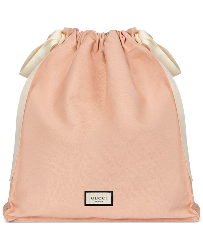 Gucci Free pink pouch with large spray purchase from the Gucci