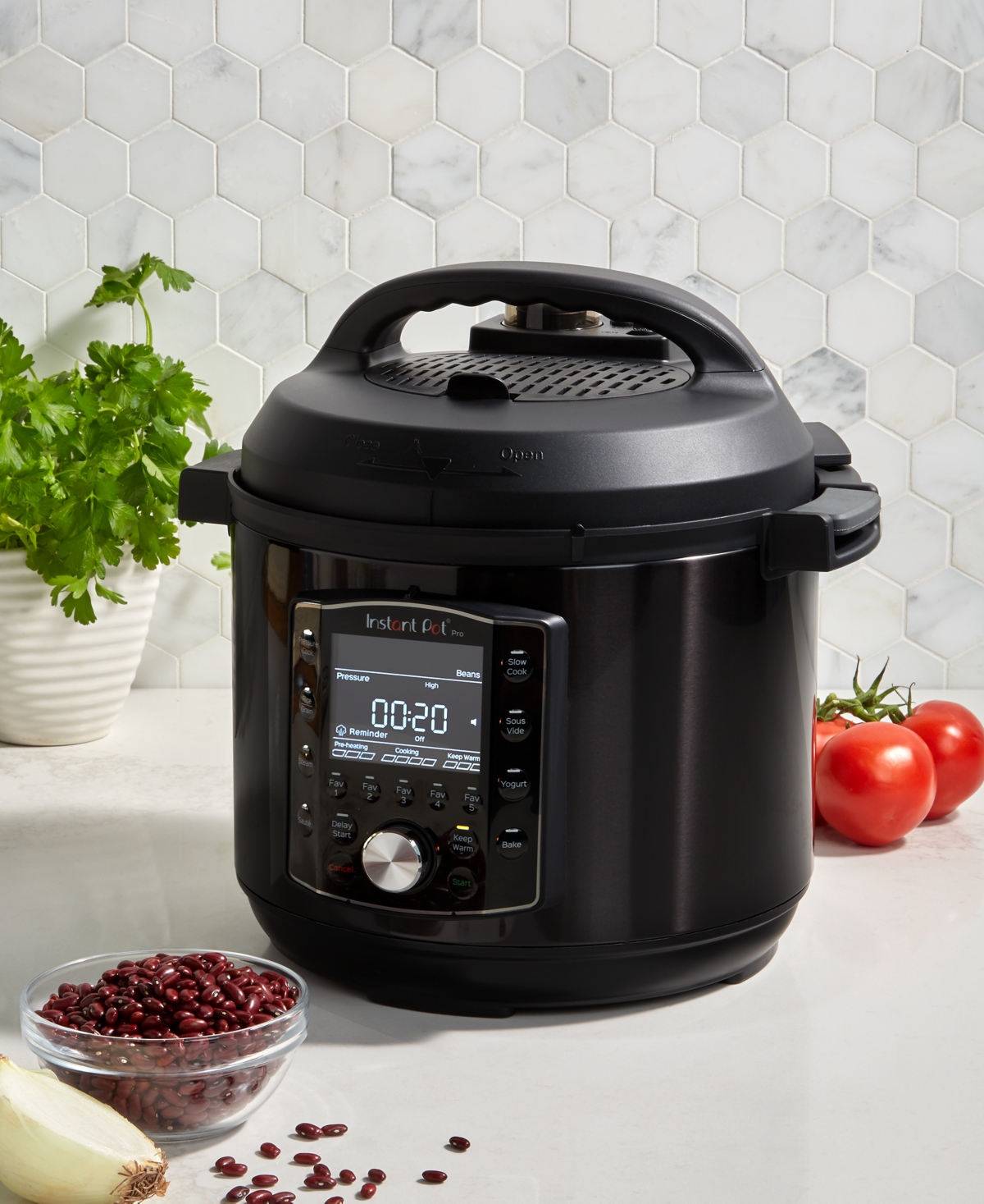Black instant pot on the kitchen counter.