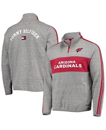 Clothing designer Tommy Hilfiger wears a Cardinal warm-up jacket