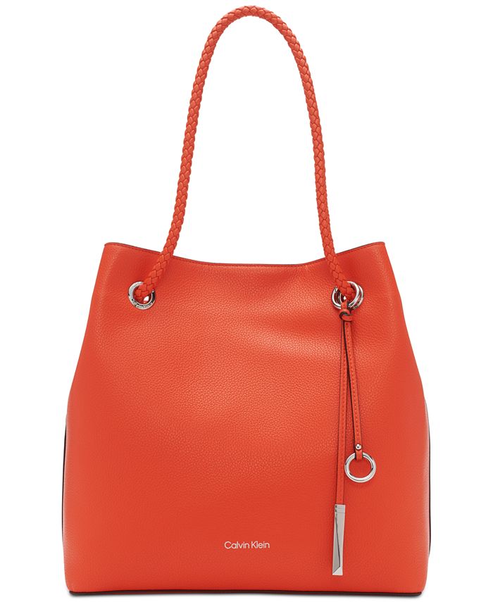 Calvin Klein Orange Handbags