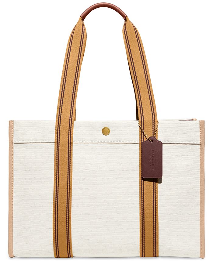 COACH - Signature Canvas Spin Tote 42. outfit accessories.must have handbags.