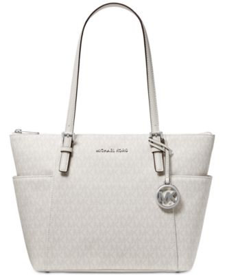 signature jet set east west top zip leather tote