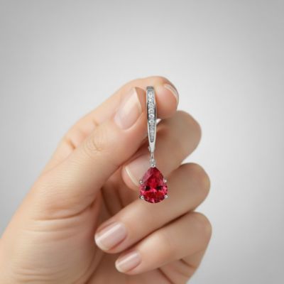 Elegant Sterling Silver Dangling Pear-Shaped Cubic Zirconia Earrings