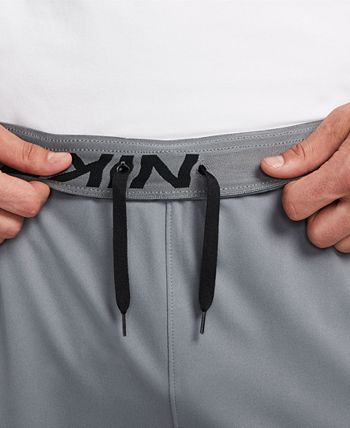 Nike Totality Men's Dri-FIT Tapered Versatile Trousers. Nike CA