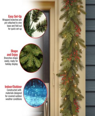 National Tree Company 9' x 12" Feel Real(R)Classical Collection Garland with Red Berries, Cedar Leaves & 100 Clear Lights