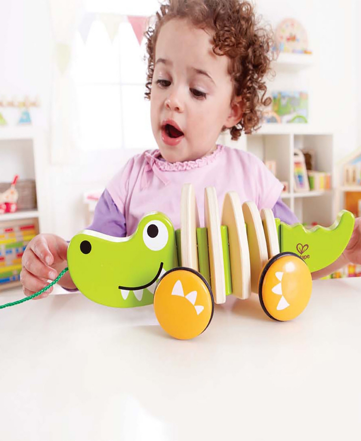 Shop Hape Walk-a-long Croc Toddler Toy In Multi