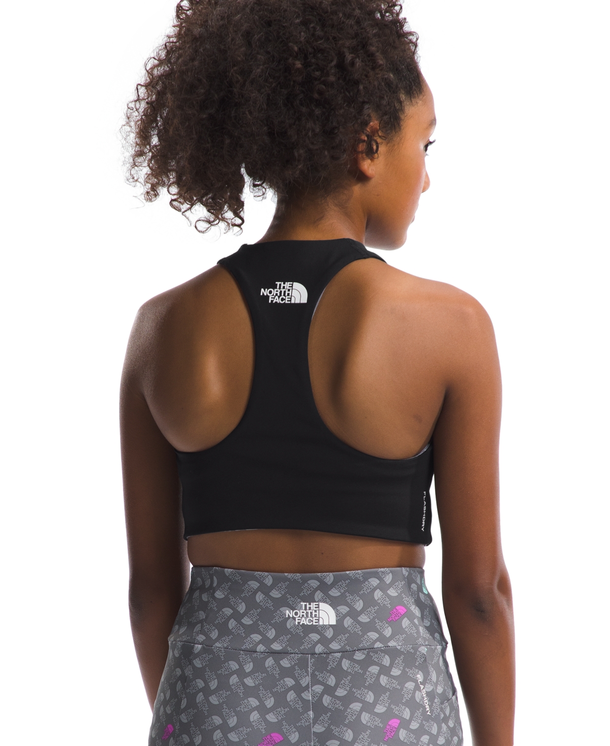 Shop The North Face Big Girls Never Stop Reversible Tanklette Top In Tnf Black,smoked Pearl Tnf Shadow Toss P