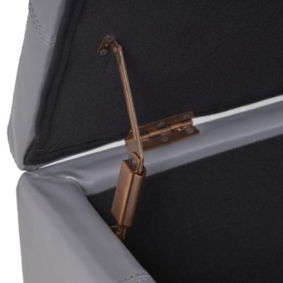 upholstered design with hidden storage is offered as a stylish storage ottoman