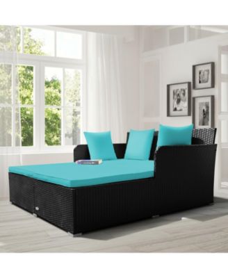Spacious Outdoor Rattan Daybed with Upholstered Cushions and Pillows