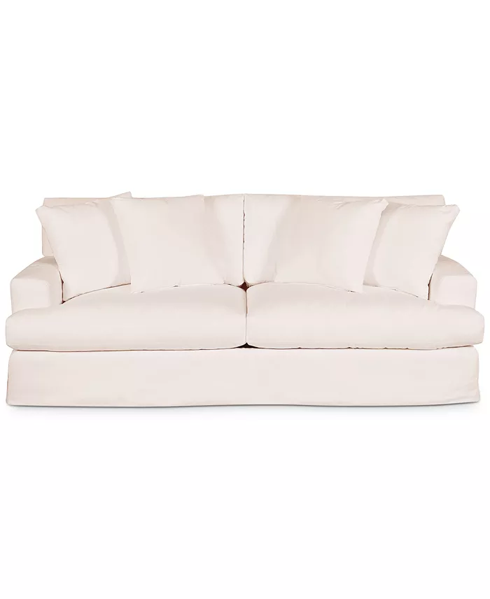 Cream performance fabric slipcover sofa with four pillows for a cowgirl coastal living room