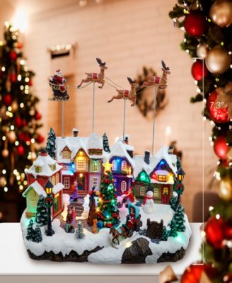 7.3-Inch Battery Operated Multicolor LED Lighted Musical Santa and Sleigh Table Piece