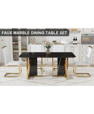 Table and chair set. Modern dining table with MDF top and beautiful MDF legs. Equipped with comfortable PU chairs and metal legs. Suitable for a wide range of decorative styles.