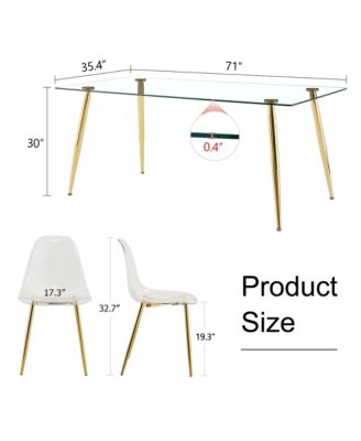 Table and chair set.Modern rectangular glass dining table with tempered glass countertop and golden metal legs, paired with multiple transparent high-quality PET dining chairs with golden legs.