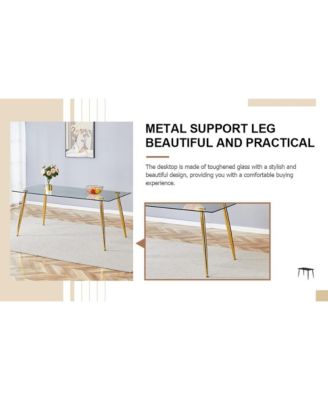 Table and chair set.Modern rectangular glass dining table with tempered glass countertop and golden metal legs, paired with multiple transparent high-quality PET dining chairs with golden legs.
