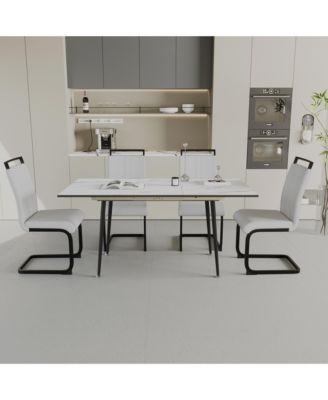 An expandable dining table set for 2-6 people, equipped with a C-shaped tubular cushioned armless dining chair and an elegant and spacious dining table kitchen table and chair set, with metal legs