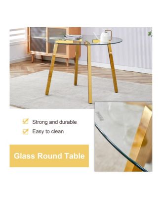Table and chair set.A Modern Minimalist Style Round Clear Tempered Glass Table with Metal Legs.Paired with white chairs with Modern PU Leather High Back Upholstered and C-Tube Golden Legs.