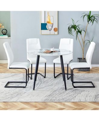 Table and chair set. Large modern white imitation marble patterned round table with black metal legs. Nice minimalism, comfortable seats and black metal legs.