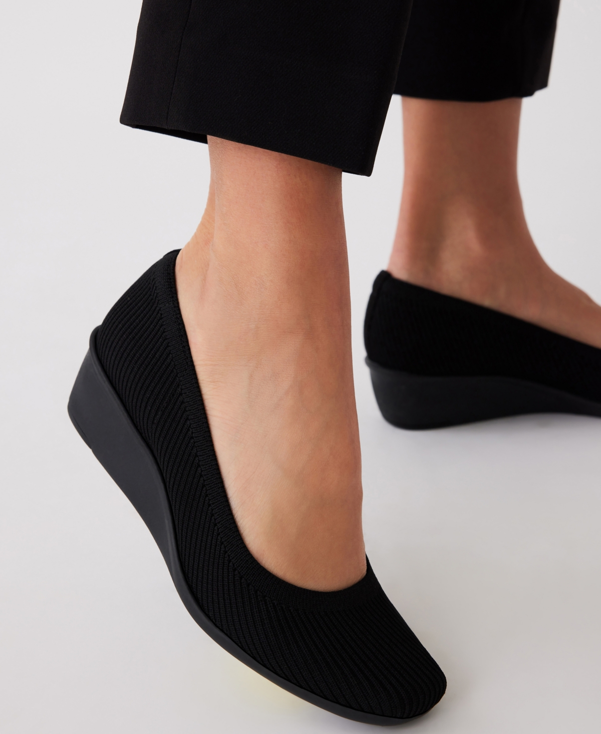 Shop Anne Klein Women's Wisher Wedge Slip On Flats In Black Knit