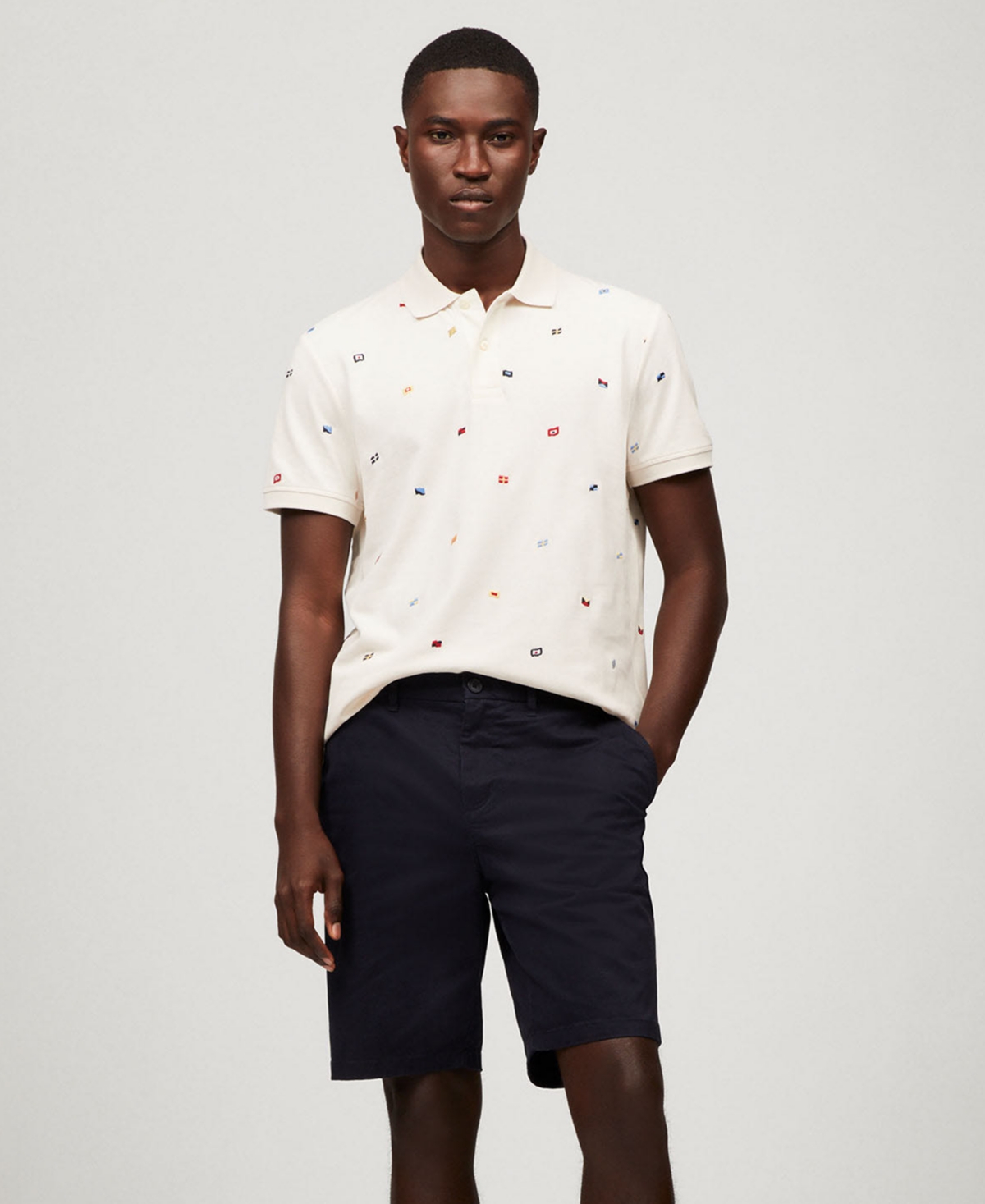 Tommy Hilfiger Men's Regular Fit Allover Flag Polo Shirt In Ivory Petal