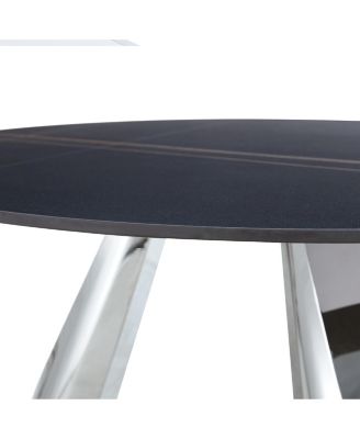 Streamdale A 42-inch burn stone round table with stainless steel legs can accommodate 4 or 6 diners