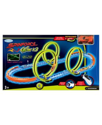R/C  car and track with three loops and glow trace technology.