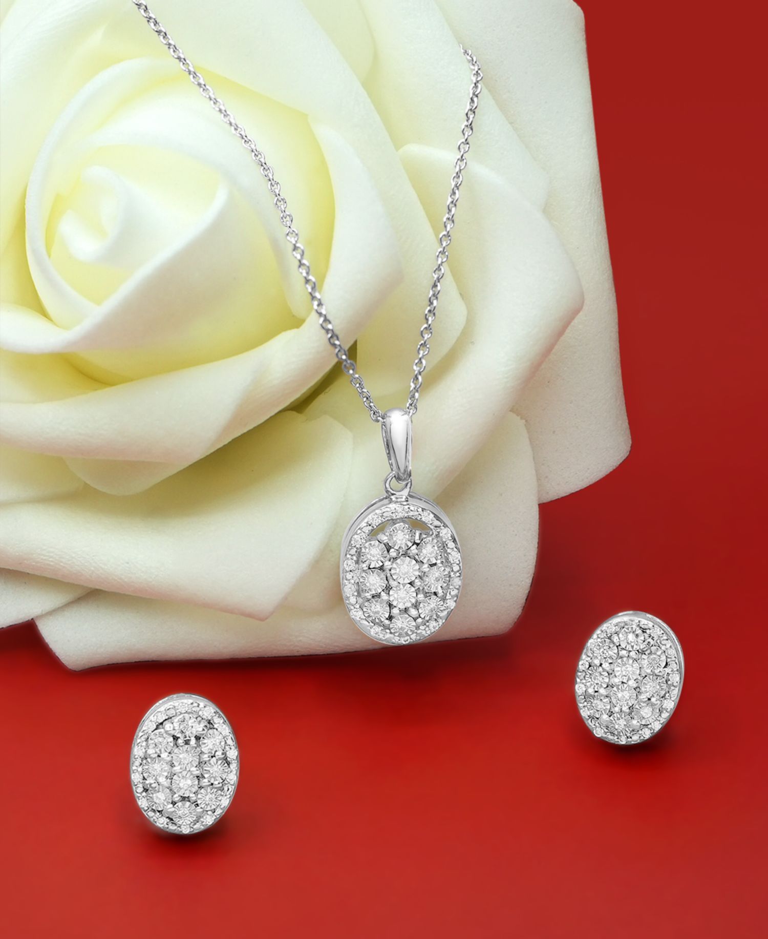 Diamond Oval Halo Cluster Earrings (1/10 ct. t.w.) in Sterling Silver