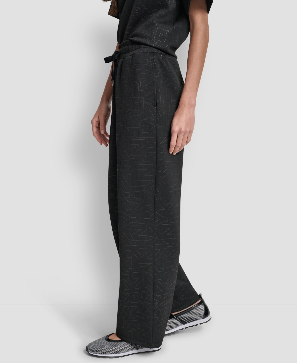 Dkny Women's Debossed Logo Pull-on Pants In Black