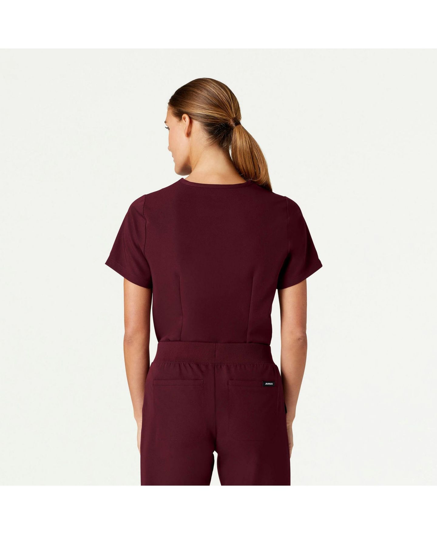 Женский топ Jaanuu Classic V-Neck Scrub with 1 Pocket, цвет: Бордовый — фото 4