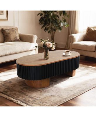 Elliptical coffee table with storage