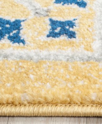 Evoke EVK251B Gold/Ivory 5'1" x 7'6" Area Rug