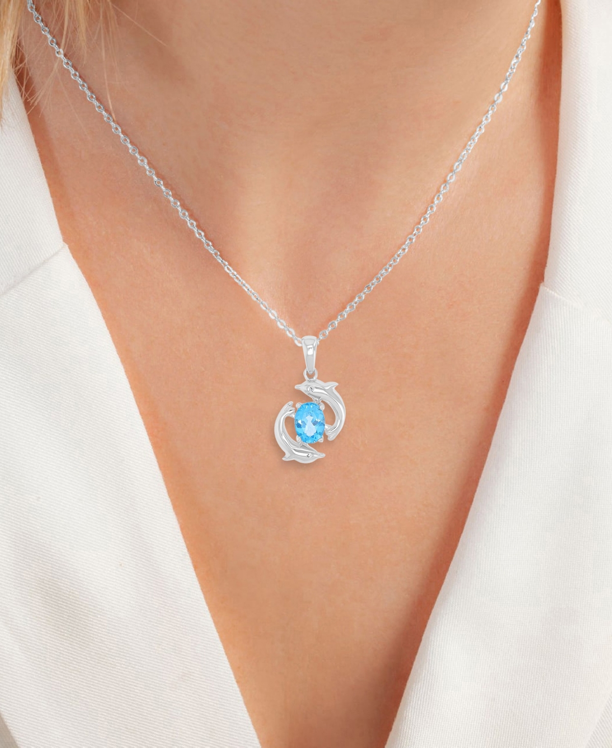 Macy's Diamond (0.006 ct. t.w.) and Swiss Blue Topaz (1 ct. t.w.) Duo Dolphins Necklace in Rhodium Over Sterling Silver