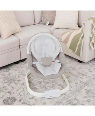 Baby evolur Comfort Cocoon Swing: TUYA voice control, 5-speed sway with remote. Features touchscreen music, removable canopy, toys, and 5-point harness.
