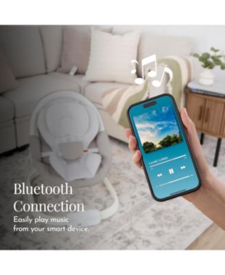 Baby evolur Comfort Cocoon Swing: TUYA voice control, 5-speed sway with remote. Features touchscreen music, removable canopy, toys, and 5-point harness.