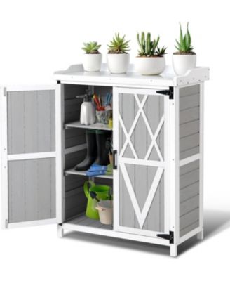 Outdoor wooden potting bench with metal worktop, waterproof storage cabinet, adjustable shelves, and double doors—ideal for gardening tasks.