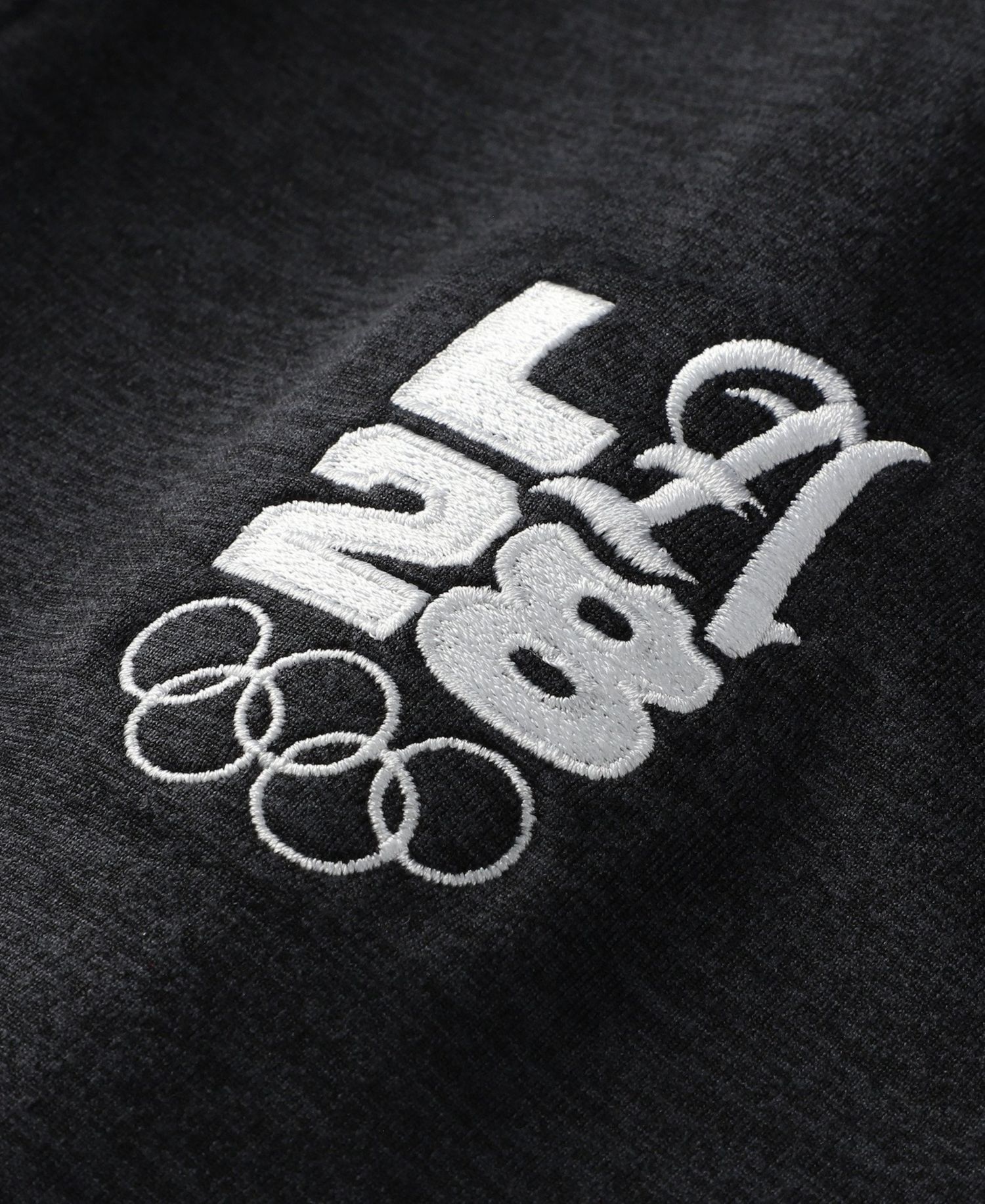 Men's Black LA28 Summer Olympics Stride Raglan Dri-FIT Half-Zip Pullover