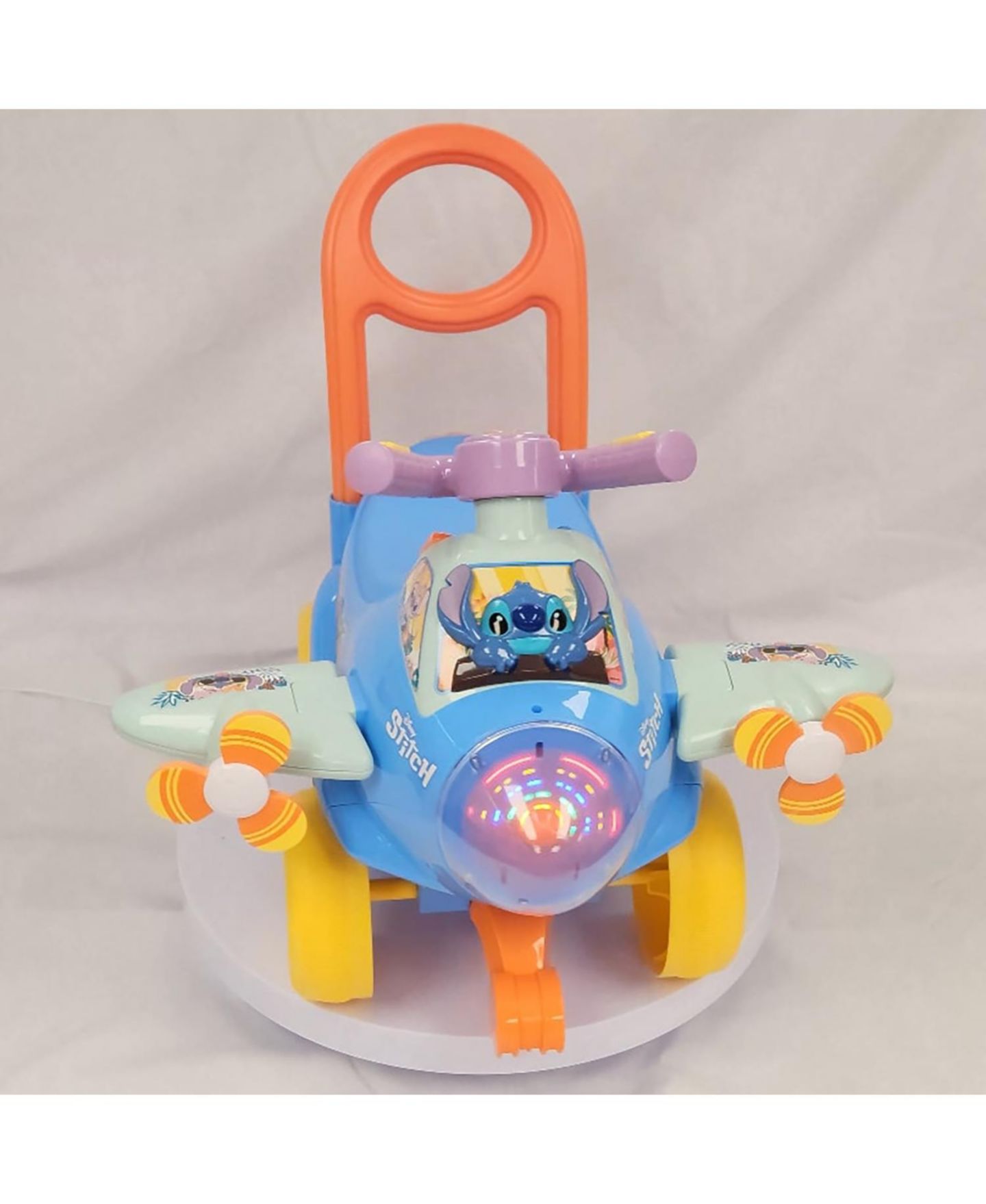 Детская игрушка Disney Stitch Spinning Lights Interactive Ride-On Plane, 20.06" x 17.32" x 16.34", Ages 1+ — фото 8