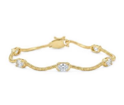 Gold-Tone Oval Cubic Zirconia Fluted Wave Bracelet, 7"