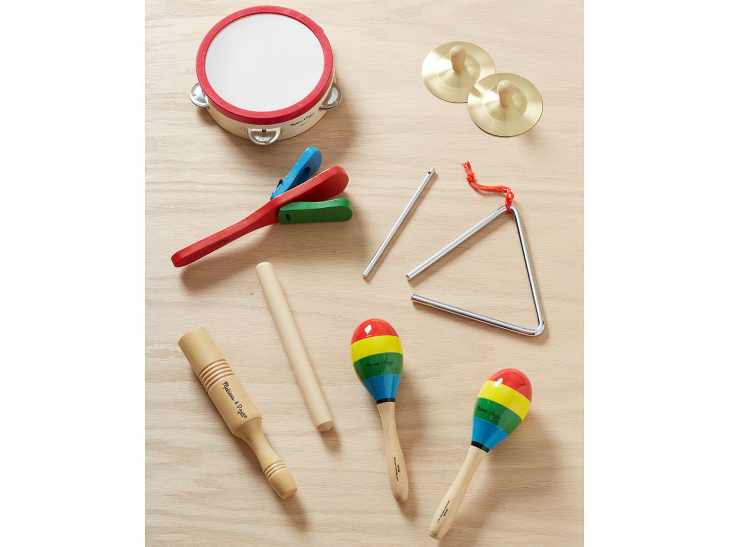 Детские игрушки Melissa and Doug Clap! Clang! Tap! Wooden 6-Piece Musical Instrument Set, Ages 3+ — фото 3