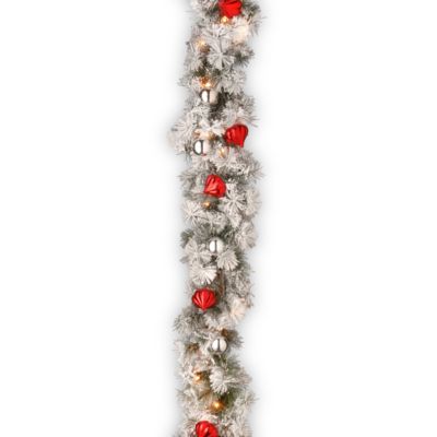 National Tree Company - 9' Snowy Bristle Pine Garland with Red & Silver Ornaments & 70 Clear Lights