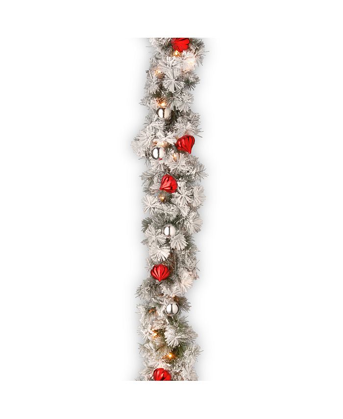 National Tree Company - 9' Snowy Bristle Pine Garland with Red & Silver Ornaments & 70 Clear Lights