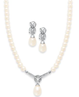 pearl necklace and diamond earrings