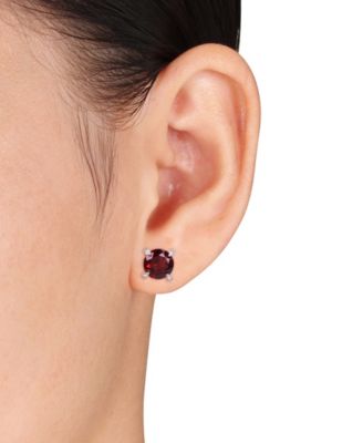 Gemstone and Diamond Accent Stud Earrings in 10k White Gold. Available in Blue Topaz (4-3/4 ct.t.w.), Citrine (3 5/8 ct.t.w), Garnet (4 ct.t.w.), Amethyst (3 ct. t.w.) & Prasiolite (3 1/2 ct.t.w.)