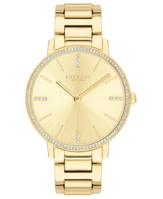 gold coach watch with diamonds