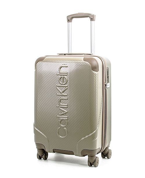 Calvin Klein Obsessed 21" CarryOn Hardside Spinner & Reviews Upright